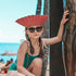 toucca kids youth polarized sunglasses - a girl modelling in swim suit in Hawaii  