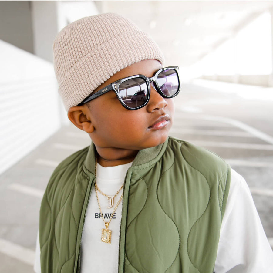 toucca kids polarized square shaped classic black sunglasses - an african american boy posing with style